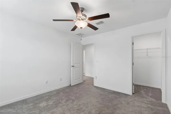 4th bedroom with walk in closet