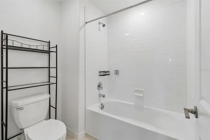 Full bathroom with tub