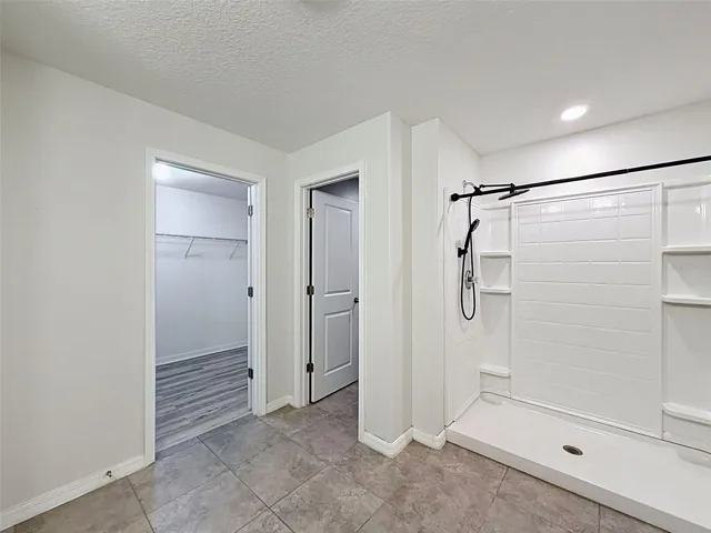 Big master bathroom easily accommodates two.