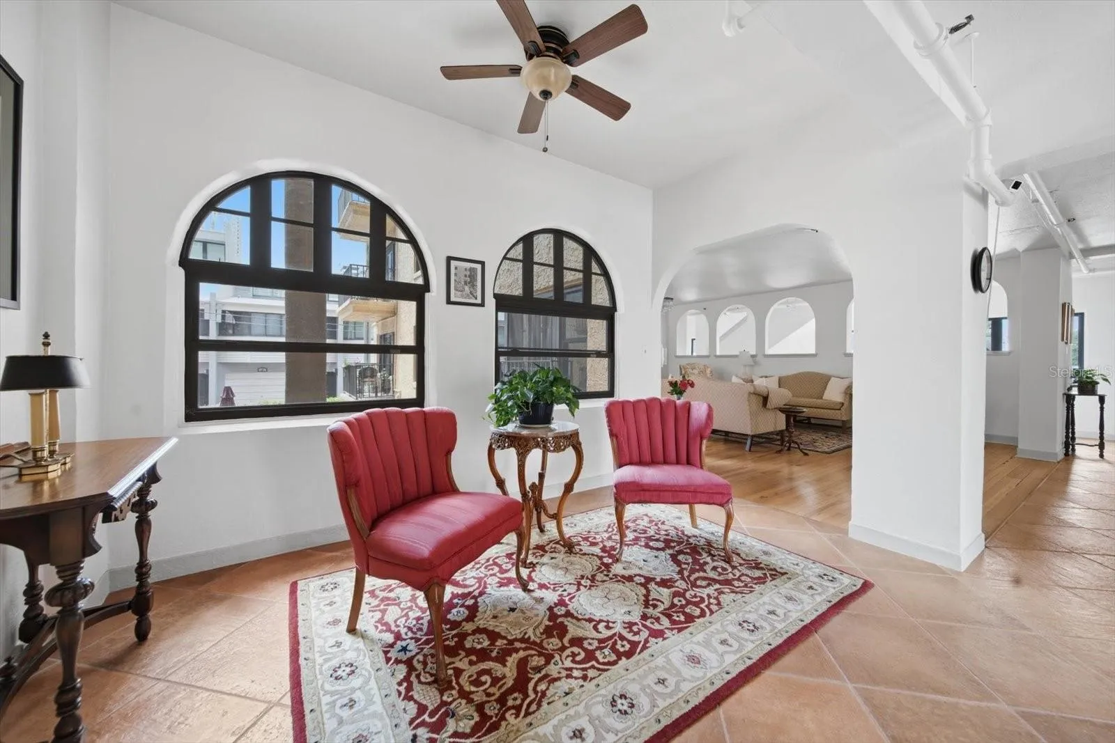 Seating areas in the foyer overlook the rear courtyard.