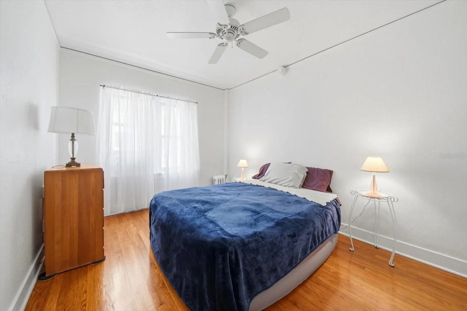 The bedroom measures 10'4" x  11'13"