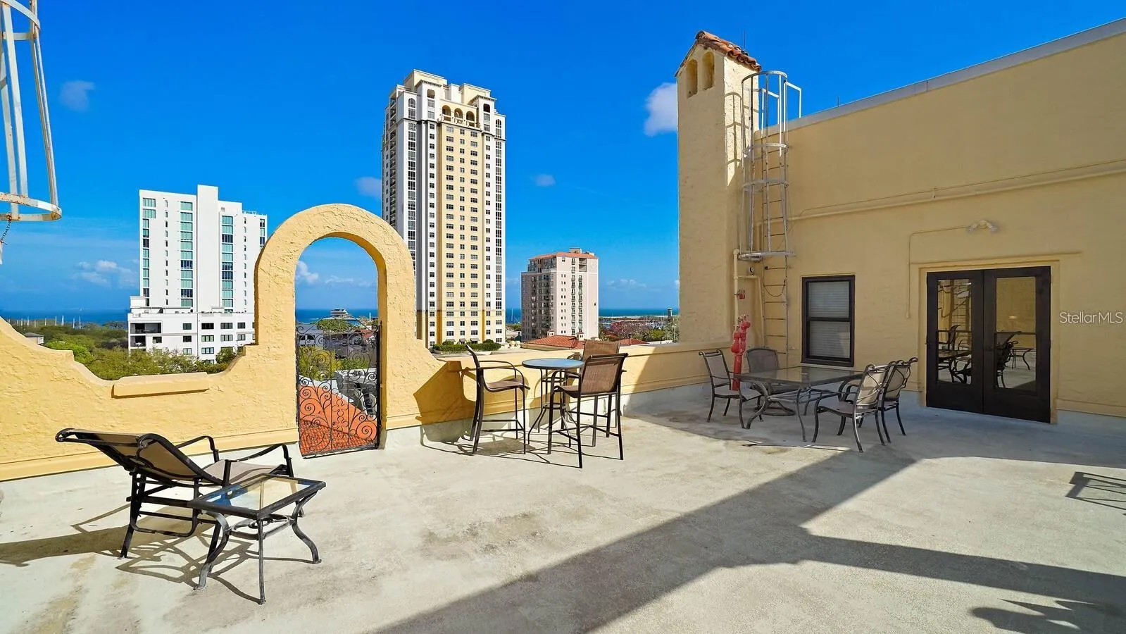 Two spacious outdoor sitting areas, one facing east and the other west, are perfect for enjoying sunrises and sunsets.