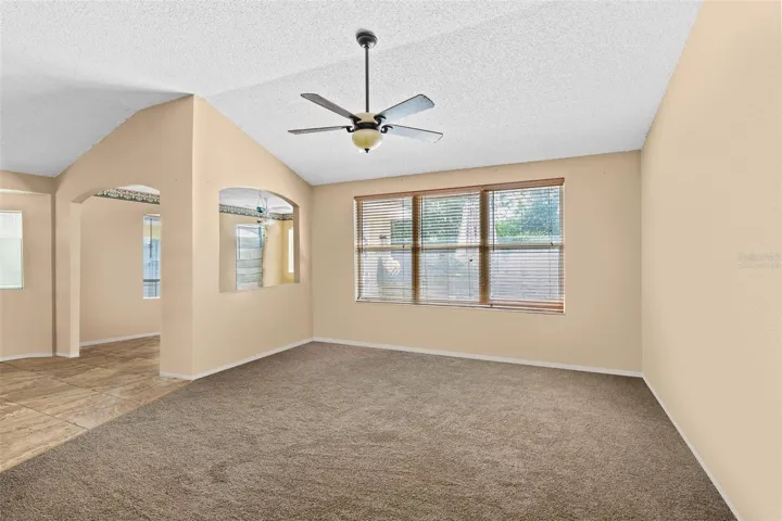 VIRTUALLY STAGED LIVING ROOM/BONUS ROOM