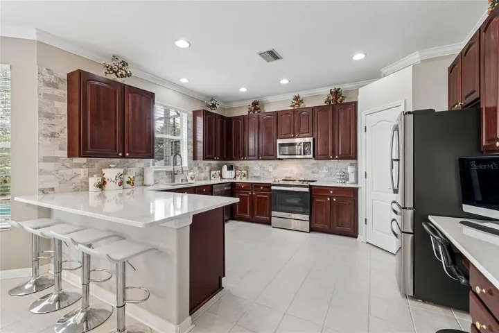 a large peninsula for casual dining or additional prep area