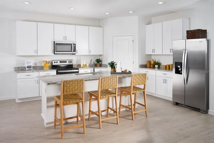 Photo is not of the actual home, but is an inspirational photo of builder’s model home and may depict options, furnishings, and/or decorator features that are not included
