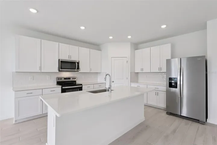The interior photos are of another home with the same floor plan and interior finishes. Some details may vary