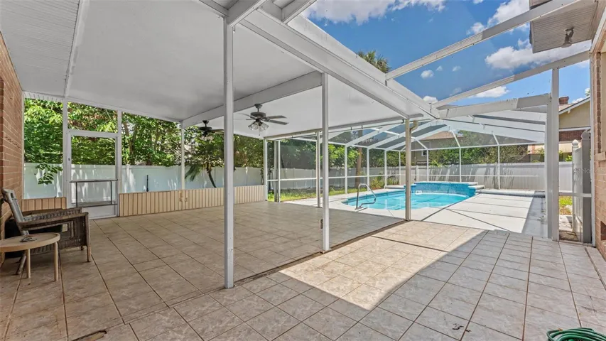 Covered Lanai and screened pool area