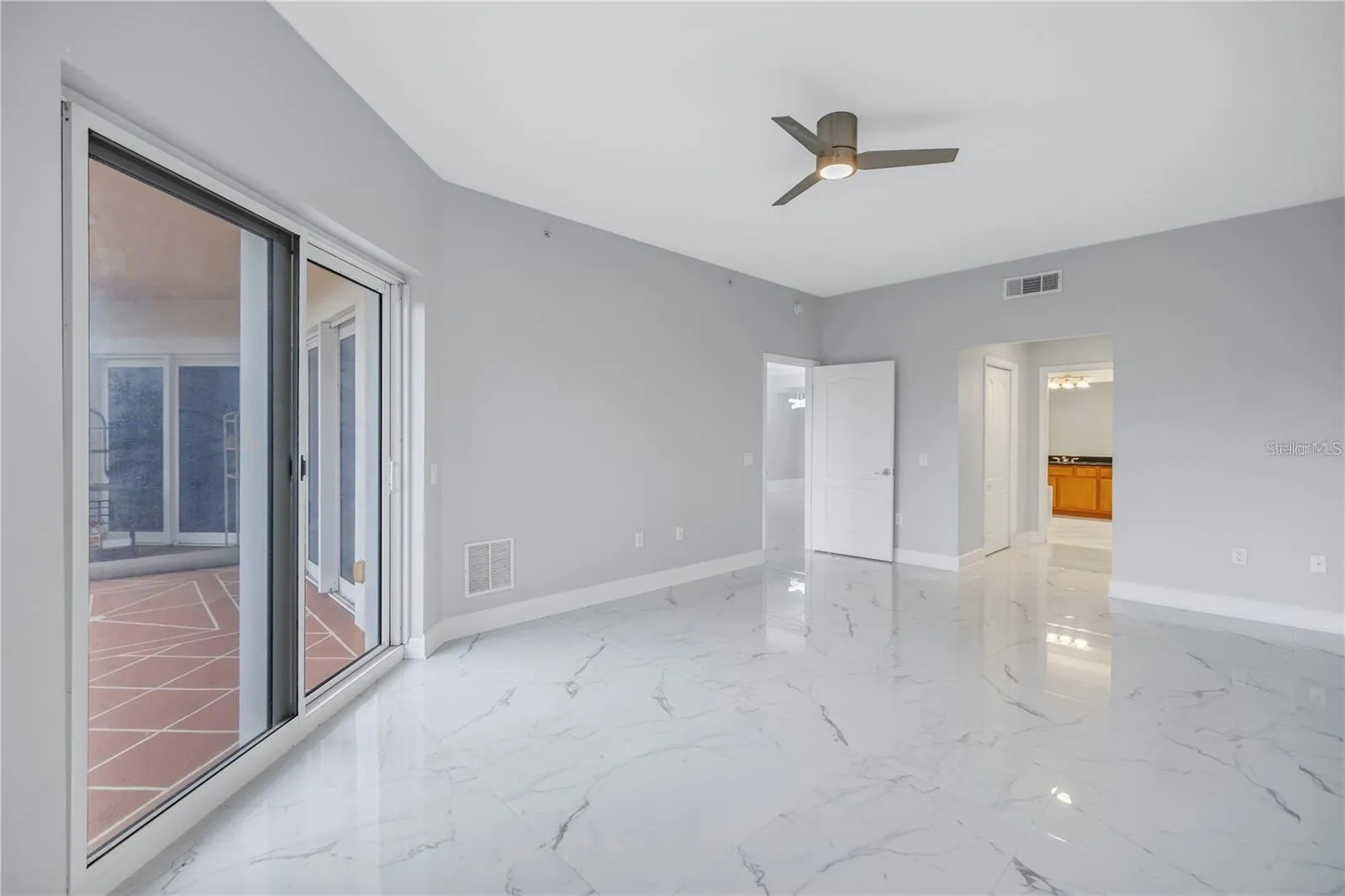 Primary Bedroom &amp; Sliders to Balcony