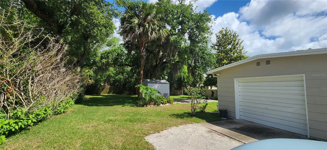 west side with garage entrance