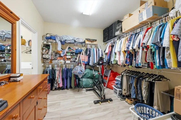 Walk through primary closet and into the laundry room