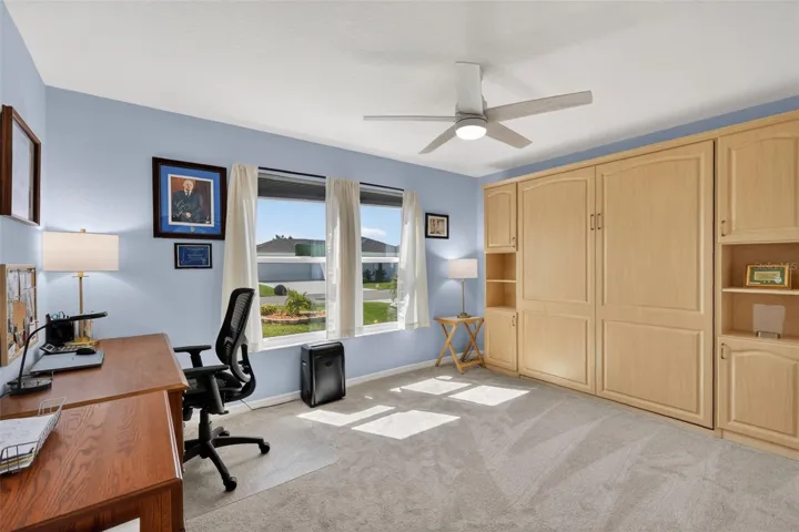 Second Bedroom with Murphy Bed and Custom Cabinetry