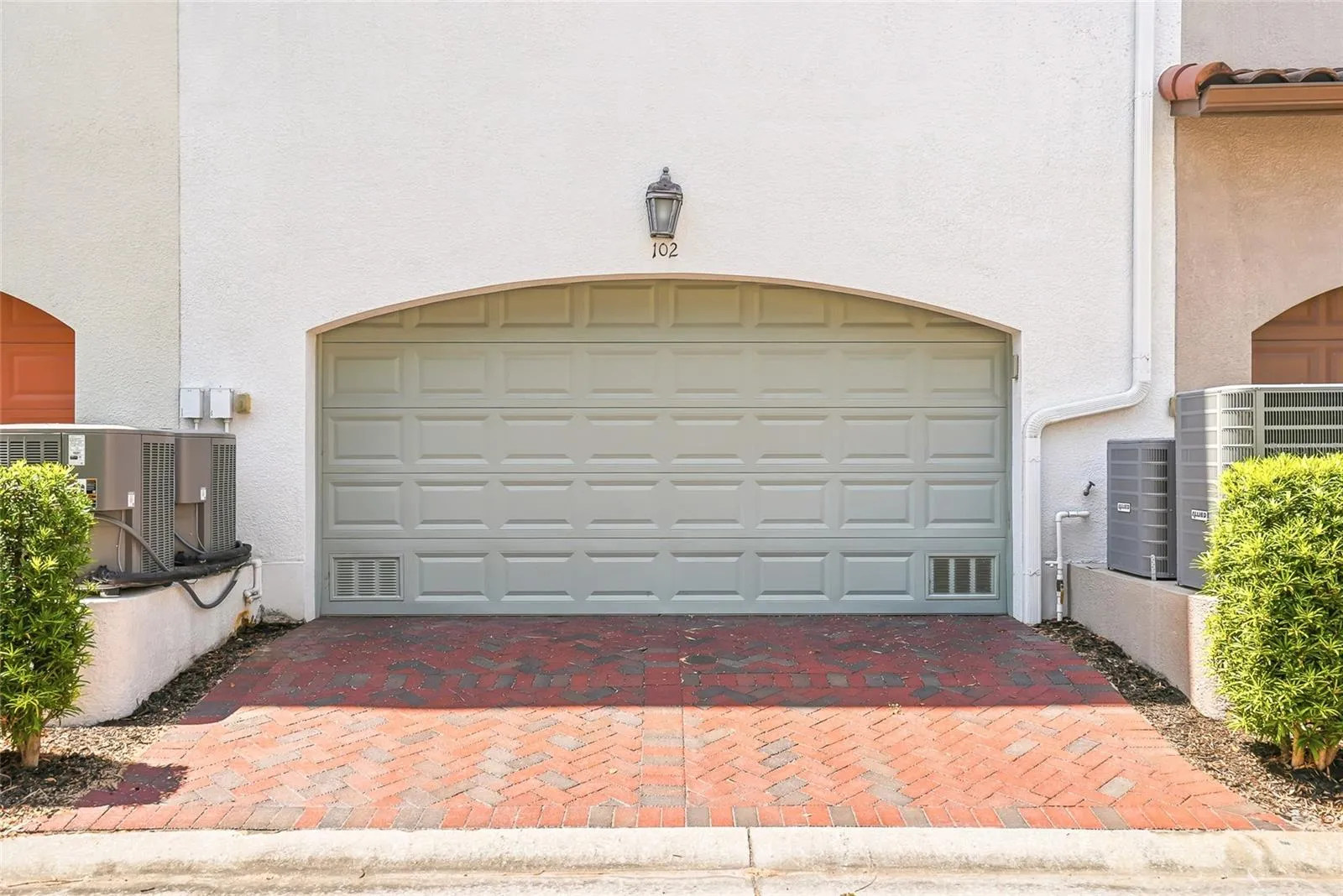 Two car garage located rear of house.