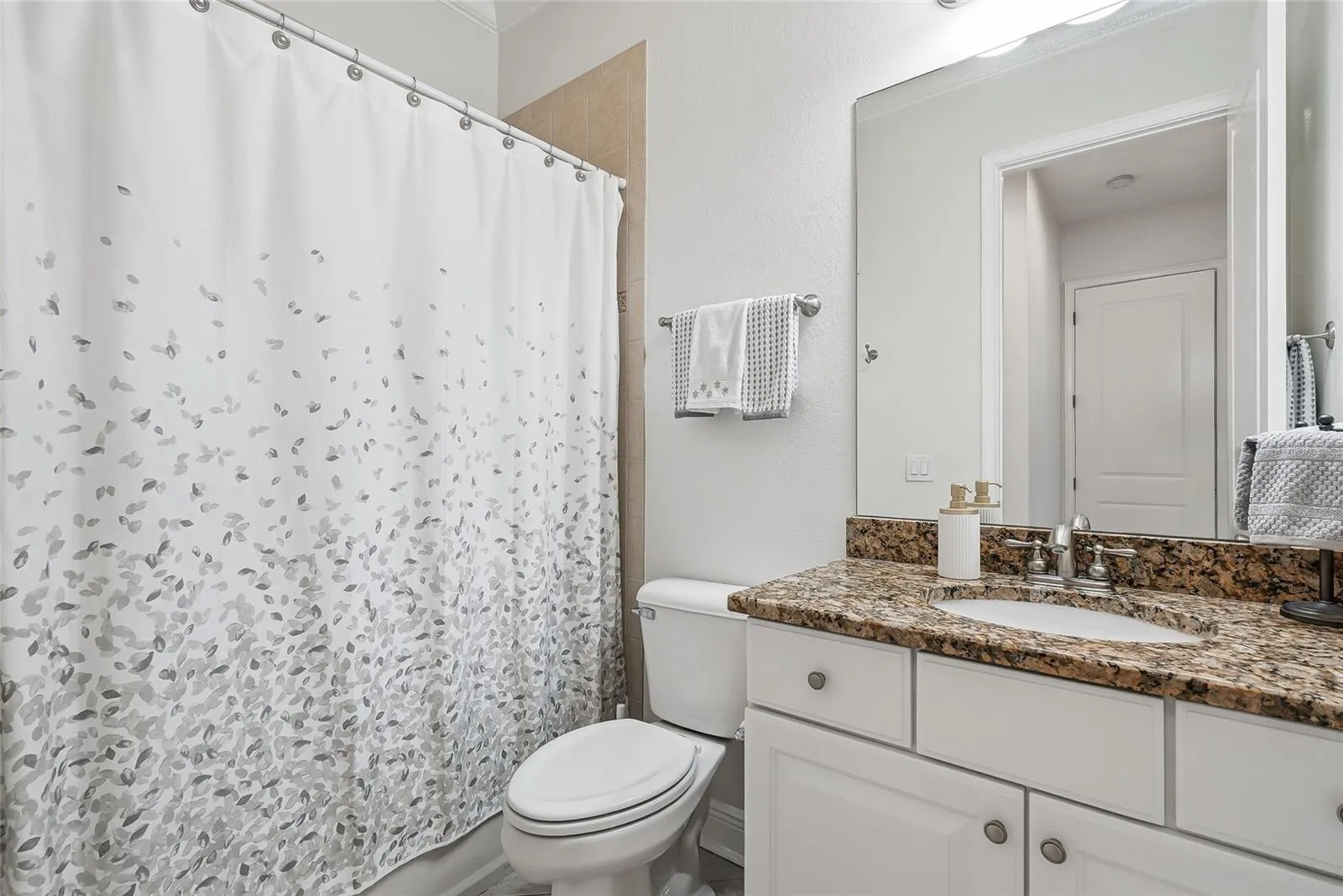 Full bathroom upstairs with shower/tub.