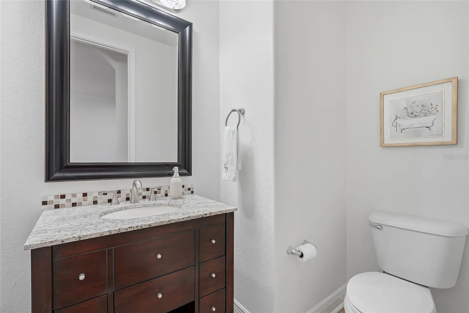 Powder bathroom located on the main level.