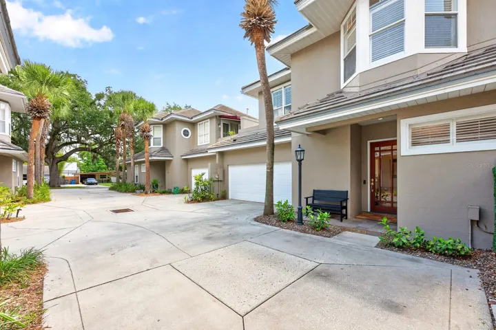 Offering over 1,600 SQUARE FEET and originally built as the BUILDER'S OWN upgraded showcase unit, this home is nestled within an intimate enclave of just four townhomes and features the LARGEST ENCLOSED BACKYARD of the four.