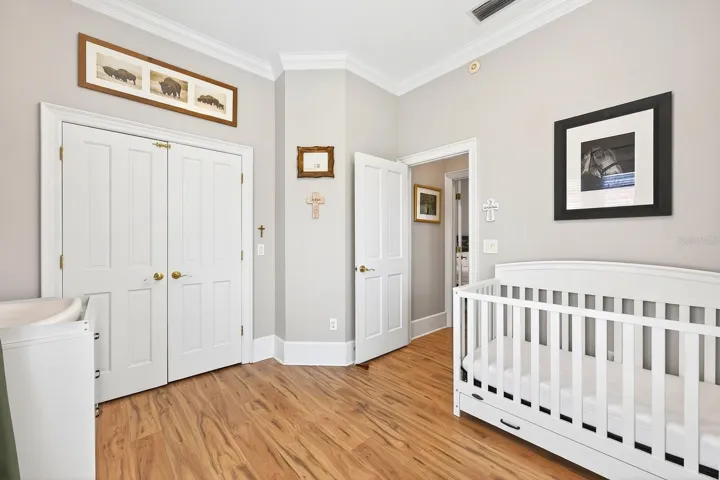 A third bedroom on the second floor offers its own unique charm with French doors opening to a PRIVATE ROOFTOP BALCONY—the perfect place to unwind and enjoy the peaceful surroundings.