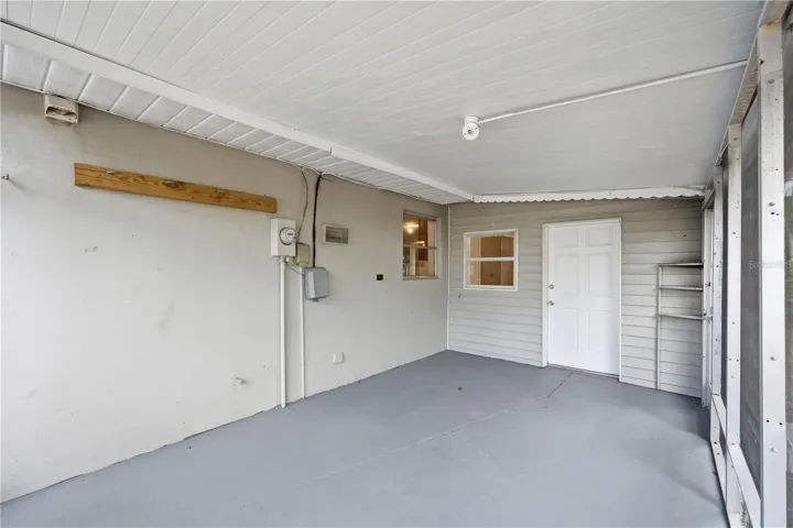 Carport with door access to the kitchen