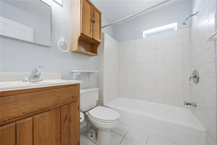 Main bathroom  with shower/tub combo located off the living room and by front and middle bedrooms
