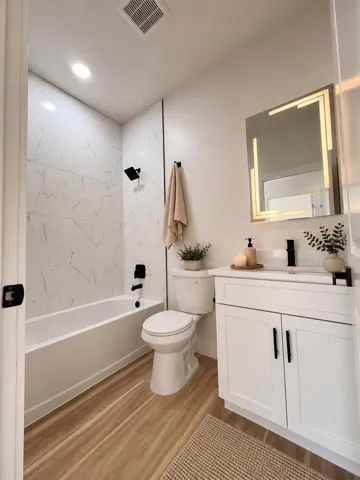 “Some images have been virtually staged using AI to illustrate potential furnishing. Property is currently unfurnished.”
