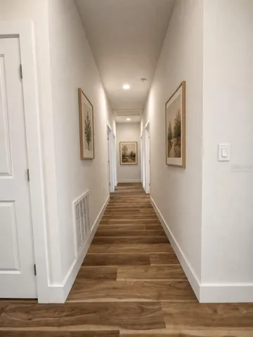“Some images have been virtually staged using AI to illustrate potential furnishing. Property is currently unfurnished.”