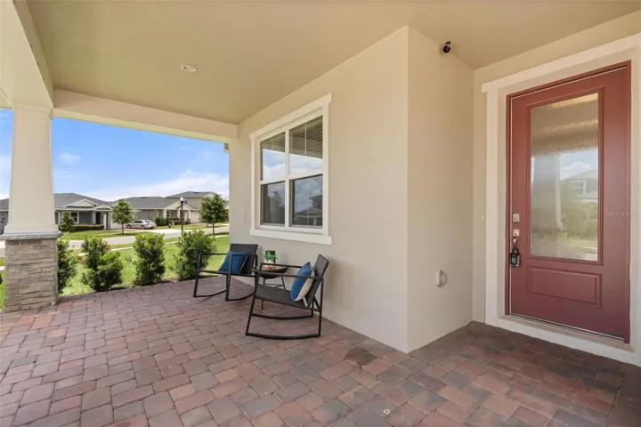 Extended covered front porch.