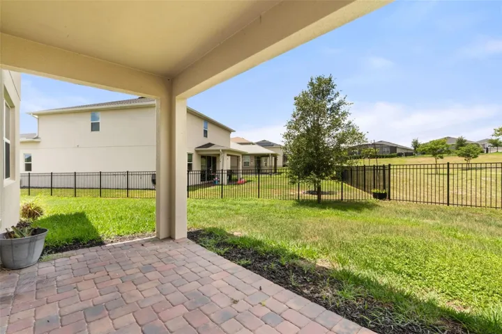 Covered pavered lanai. Plenty of space to add a pool if desirable.