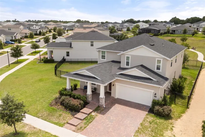 Set on a curve providing over 1/4 acre lot with bonus side yard!