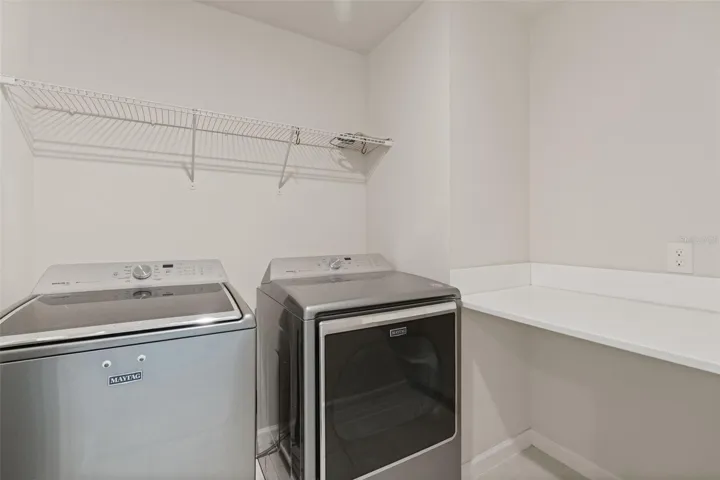 Oversized upstairs laundry room!
