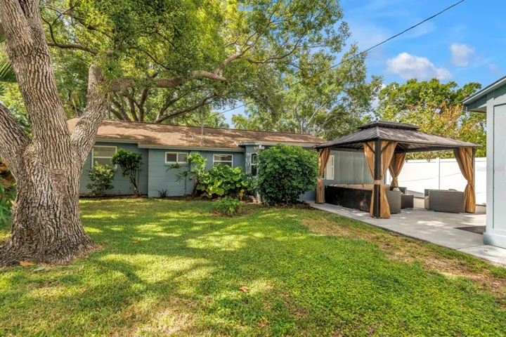 Shaded backyard with Gazebo and Shed