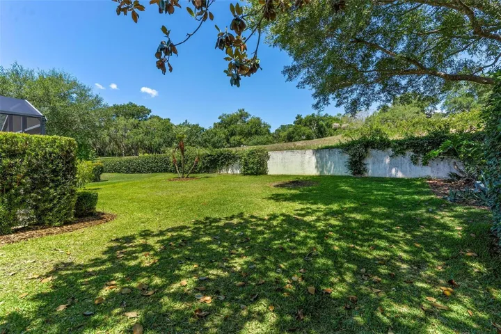 Tree shaded private backyard. Nice!