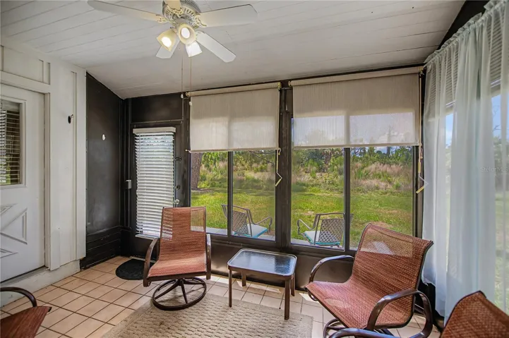 Spacious lanai with new windows making it a great seating area all year long.