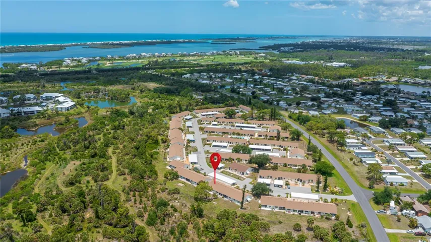 Aerial views showing Lemon Bay and the Gulf of Mexico in the rear