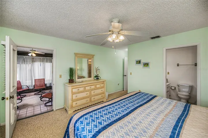 Doors from master bedroom to lanai and en suite.