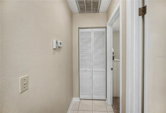 Linen closet in the hall next to guest bedroom.