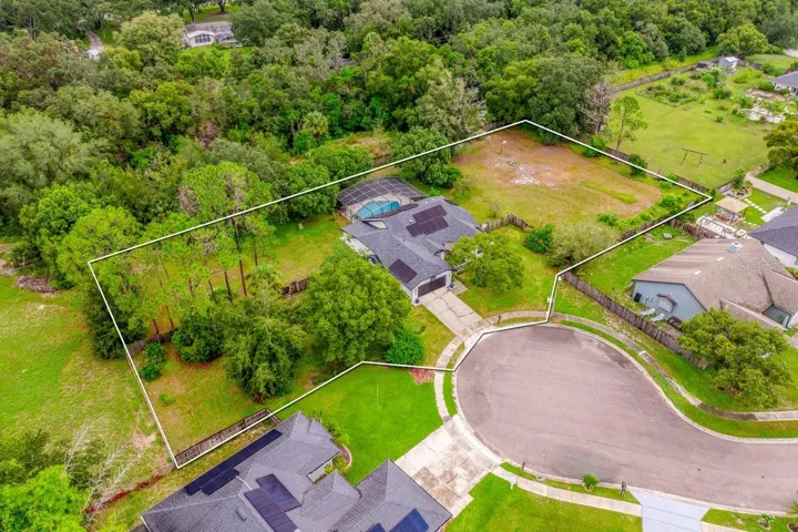Sitting on just **OVER AN ACRE** at the end of a quiet **CUL-DE-SAC**, this single story **POOL HOME** combines privacy, upgrades, and location in a way that is hard to find!