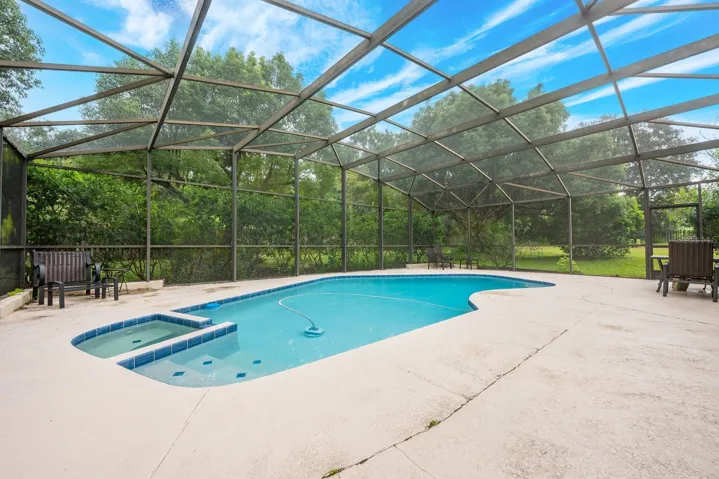 Private pool and spa are screened for the ultimate in indoor/outdoor living!