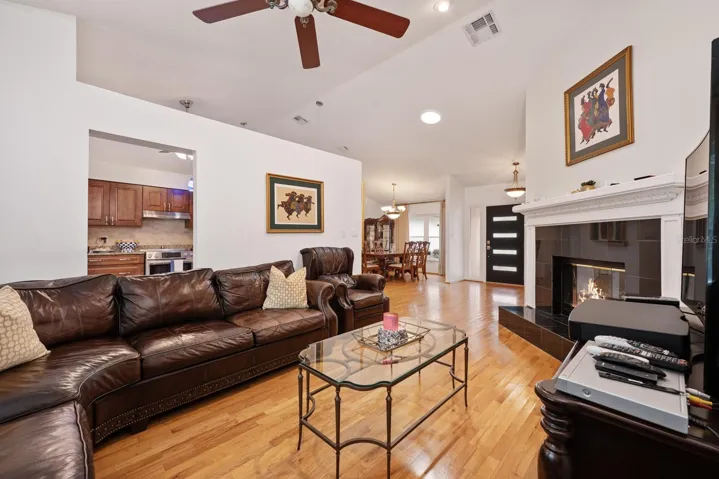 High ceilings and a fireplace complete your perfect gathering space.