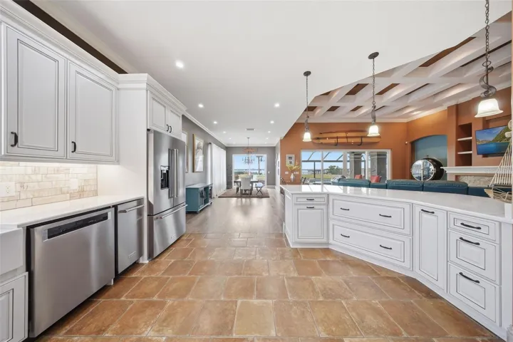 Huge kitchen with access to THREE interior pantries