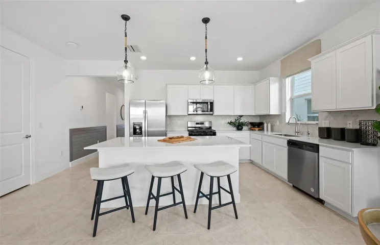 Photos are from a furnished model. Options for this home may vary.