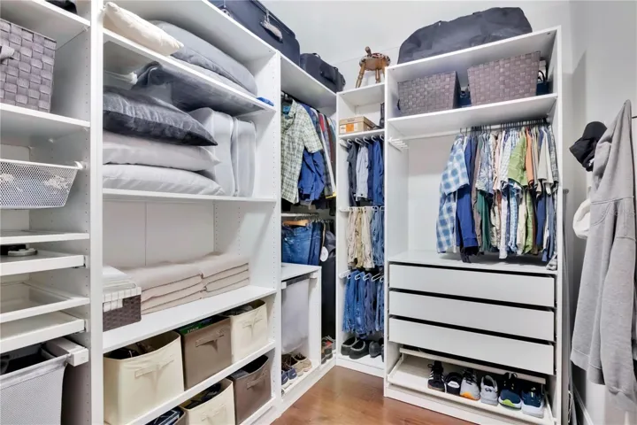 Primary downstairs Custom Walk-In Closet