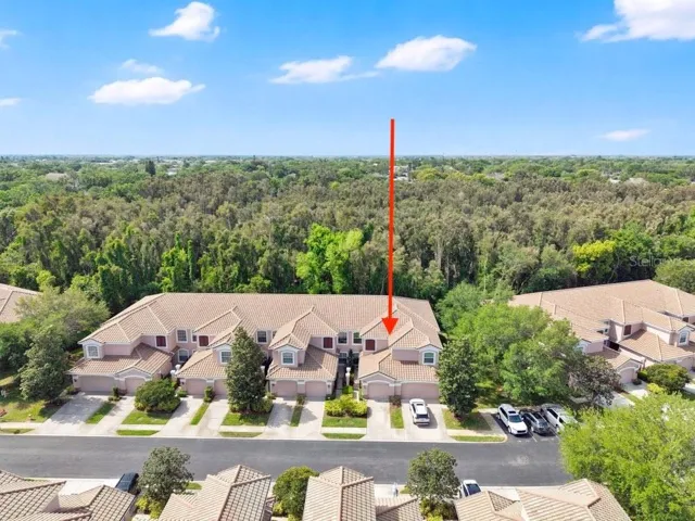 Ground floor end unit prime location backs to conservation for ultimate peace, quiet, and privacy!