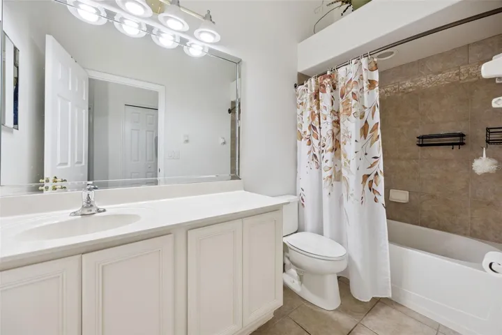 Good sized Vanity adds to this Secondary Bathroom.