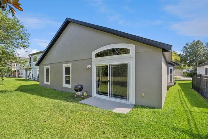Rear Exterior with open porch.