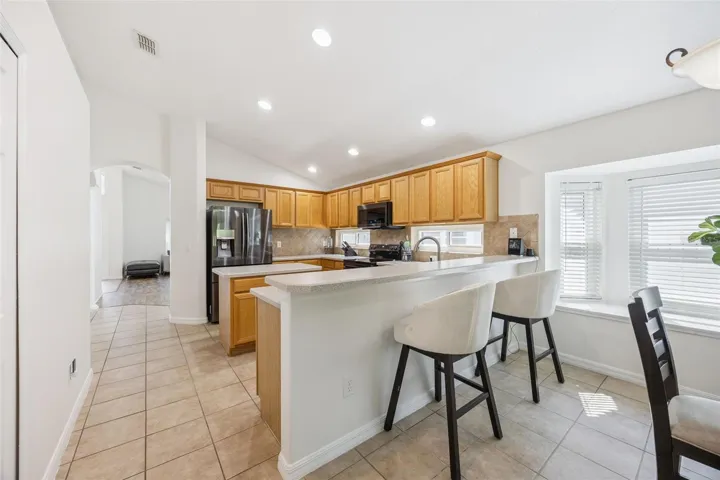 Your not left alone in the kitchen with additional seating at the Breakfast Bar.