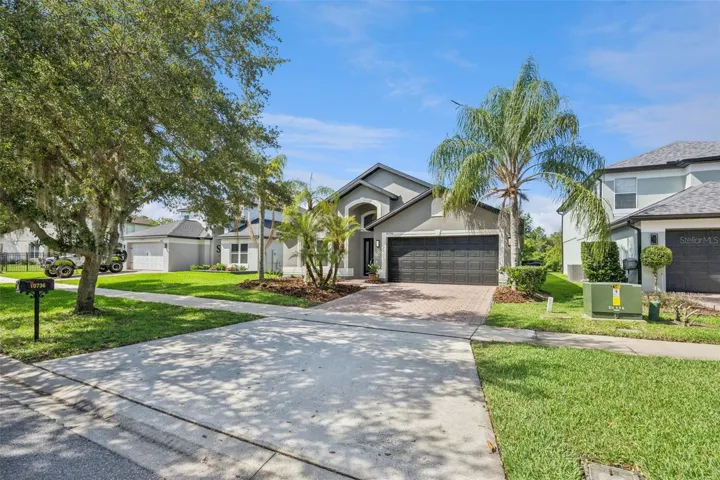 Beautifully Landscaped and Paver Driveway.
