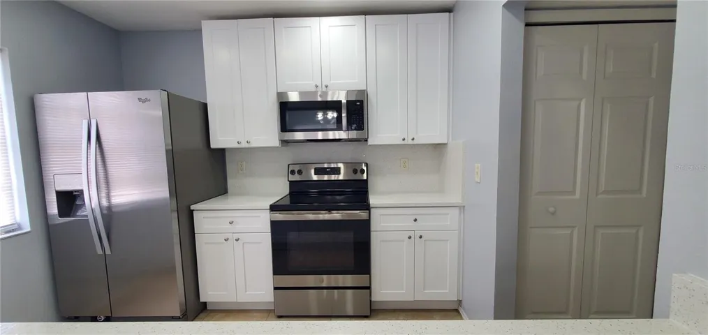 Granite Counters & Backsplash! Soft close drawers & cabinets.