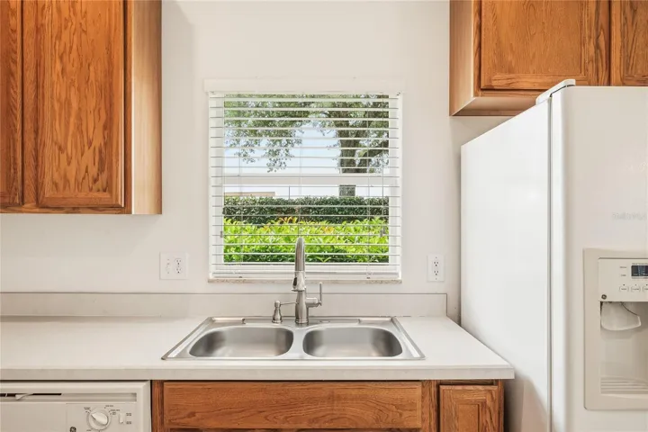 Enjoy the view and abundant light from this end unit.