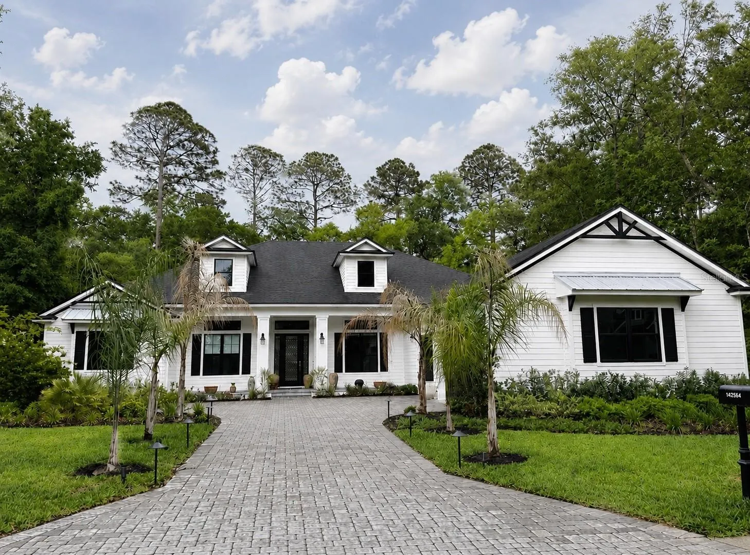 Front of home with so much curb appeal.