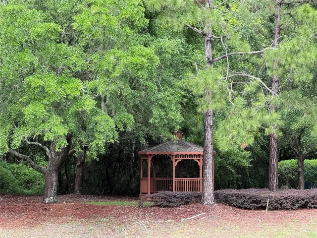 Gazebo steps from house.