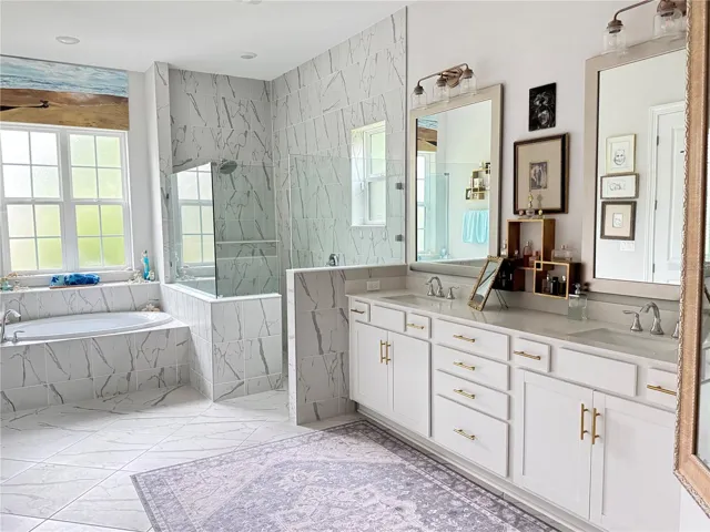 DOuble vanities and tons of storage in primary bathroom